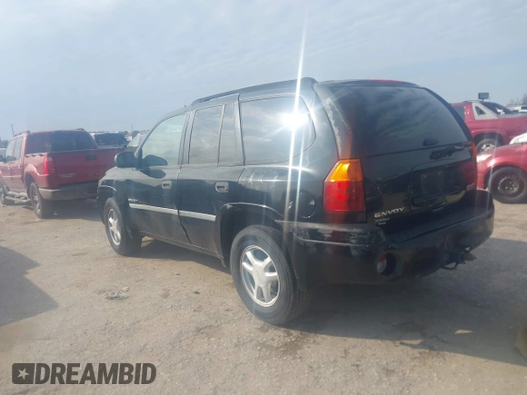 2006 GMC Envoy SLT with VIN 1GKDS13S062234137, listed as a IAAI auction lot 41561864 with 221,031 mi miles. Bid and sale history available at carsss.com. Image 3.