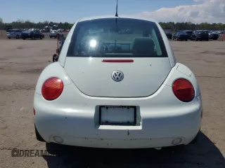 2002 Volkswagen Beetle GLS z VIN 3VWCK21C42M457645, wystawiony jako Copart lot #55900935 z przebiegiem 112 836 mil mil oraz Czysty tytuł • Clean title. Historia ofert i sprzedaży dostępna na DreamBid. Obrazek 6.