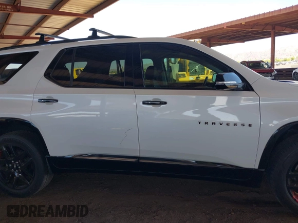 2020 Chevrolet Traverse Premier with VIN 1GNERKKW3LJ117912, listed as a IAAI auction lot 42317330 with 113,576 mi miles and . Bid and sale history available at DreamBid. Image 13.