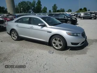 2015 Ford Taurus SEL with VIN 1FAHP2E80FG121013, listed as a Copart auction lot 59940235 with 209,632 mi miles and Clean title. Bid and sale history available at DreamBid. Image 13.