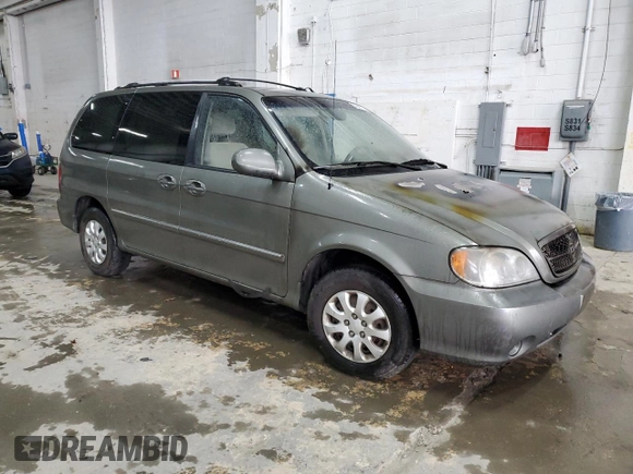2005 Kia Sedona LX with VIN KNDUP132656723226, listed as a Copart auction lot 52886115 with 0 mi miles and Salvage Title. Bid and sale history available at carsss.com. Image 4.