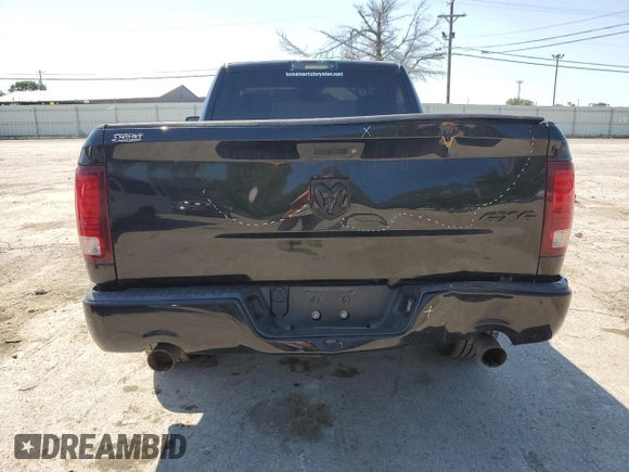 2015 Ram 1500 Express with VIN 3C6JR7AT1FG532946, listed as a Copart auction lot 63496534 with 114,396 mi miles and Salvage title. Bid and sale history available at DreamBid. Image 6.