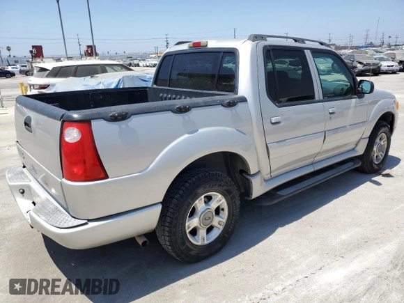 2004 Ford Explorer Sport Trac XLS with VIN 1FMZU67K34UA98361, listed as a Copart auction lot 66230905 with 228,461 mi miles and Clean title. Bid and sale history available at DreamBid. Image 3.