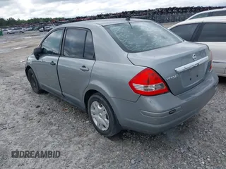 2010 Nissan Versa 1.8 S with VIN 3N1BC1AP1AL382273, listed as a IAAI auction lot 41980242 with 250,870 mi miles. Bid and sale history available at carsss.com. Image 3.