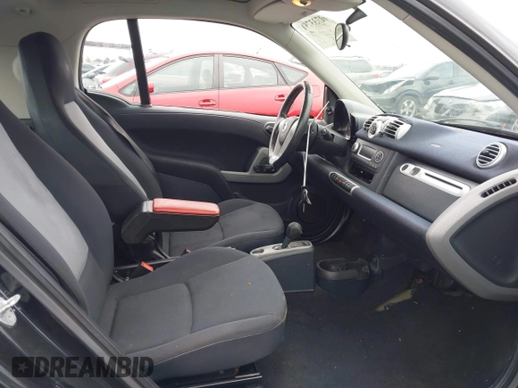 2013 Smart fortwo Pure with VIN WMEEJ3BA1DK651627, listed as a IAAI auction lot 42733791 with 130,561 mi miles and . Bid and sale history available at DreamBid. Image 5.