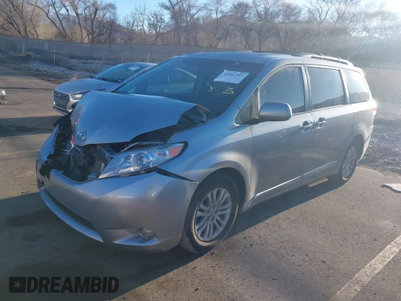 2014 Toyota Sienna XLE z VIN 5TDYK3DC9ES508300, wystawiony jako IAAI lot #41867307 z przebiegiem 93 798 mil mil oraz . Historia ofert i sprzedaży dostępna na DreamBid. Obrazek 17.