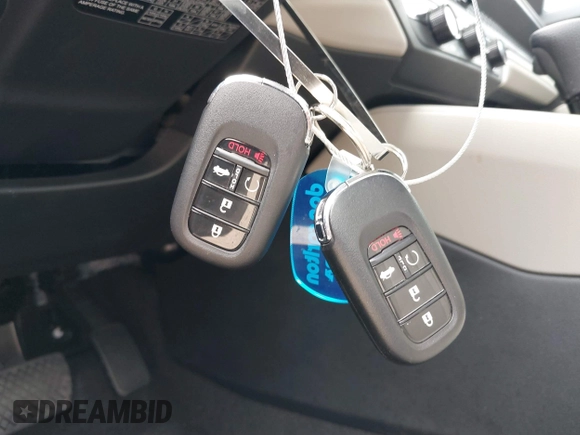 2024 Honda Accord LX z VIN 1HGCY1F28RA046057, wystawiony jako IAAI lot #42009898 z przebiegiem 4831 mil mil oraz . Historia ofert i sprzedaży dostępna na DreamBid. Obrazek 11.
