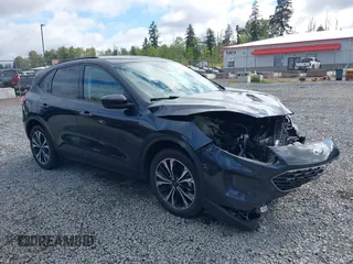 2022 Ford Escape SE Hybrid z VIN 1FMCU9BZ5NUA06681, wystawiony jako IAAI lot #42302156 z przebiegiem 61 582 mil mil oraz . Historia ofert i sprzedaży dostępna na DreamBid. Obrazek 1.