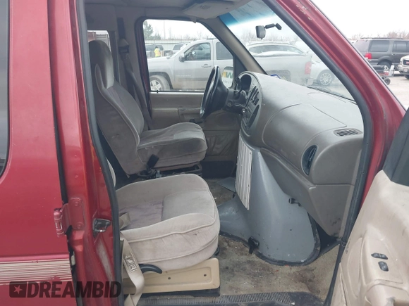1999 Ford Econoline Cargo with VIN 1FDRE14W0XHB06565, listed as a IAAI auction lot 41496511 with 165,268 mi miles. Bid and sale history available at carsss.com. Image 5.