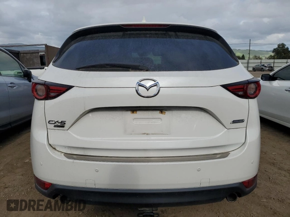 2019 Mazda CX-5 Signature with VIN JM3KFBEYXK0537826, listed as a Copart auction lot 50063015 with 76,448 mi miles and Salvage Title. Bid and sale history available at carsss.com. Image 6.