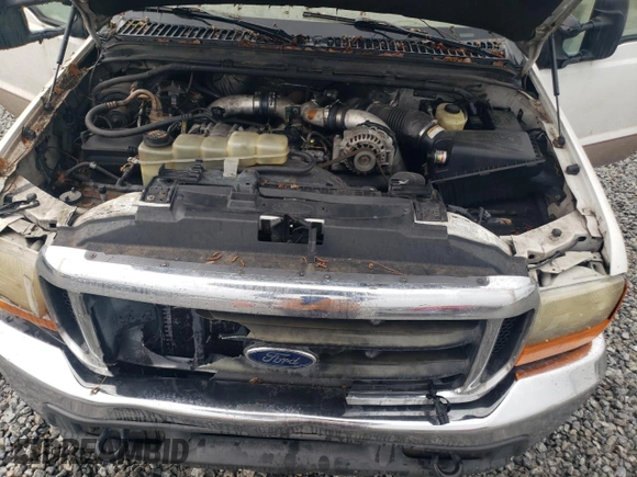 1999 Ford F-350 XL z VIN 1FTWW32F3XEA00728, wystawiony jako Copart lot #58577255 z przebiegiem 461 795 mil mil oraz Szkoda całkowita • Salvage title. Historia ofert i sprzedaży dostępna na DreamBid. Obrazek 11.