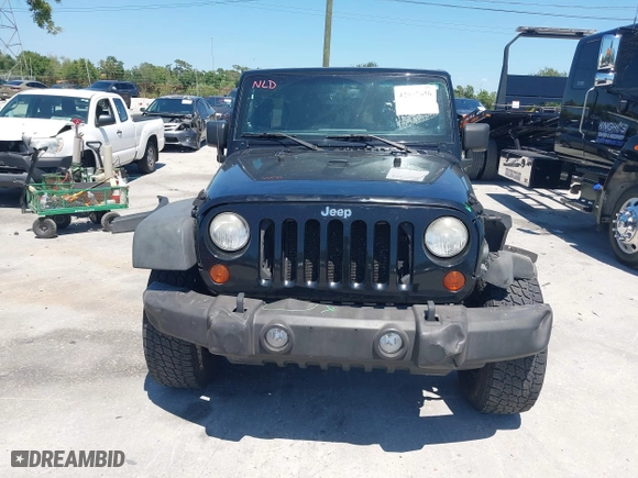 2013 Jeep Wrangler Unlimited Sport with VIN 1C4BJWDG7DL583686, listed as a IAAI auction lot 42037650 with 122,408 mi miles. Bid and sale history available at carsss.com. Image 13.