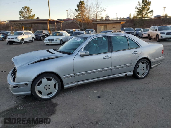 2000 Mercedes-Benz E-Class with VIN WDBJF70JXYB113988, listed as a Copart auction lot 86325514 with 198,321 mi miles and Salvage Title. Bid and sale history available at carsss.com. Image 1.