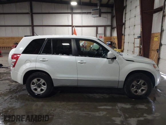 2011 Suzuki Grand Vitara Premium z VIN JS3TD0D24B4101861, wystawiony jako IAAI lot #41620401 z przebiegiem 151 034 mil mil oraz . Historia ofert i sprzedaży dostępna na DreamBid. Obrazek 13.