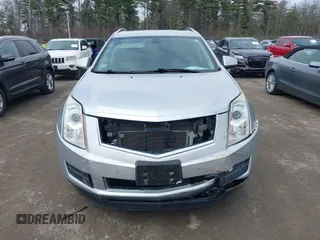 2014 Cadillac SRX Luxury Collection z VIN 3GYFNEE33ES670356, wystawiony jako IAAI lot #42008087 z przebiegiem 59 953 mil mil oraz . Historia ofert i sprzedaży dostępna na DreamBid. Obrazek 6.