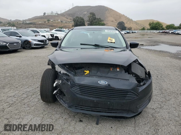 2018 Ford Focus SE with VIN 1FADP3FE8JL300246, listed as a Copart auction lot 59585035 with 83,141 mi miles and Salvage title. Bid and sale history available at DreamBid. Image 5.