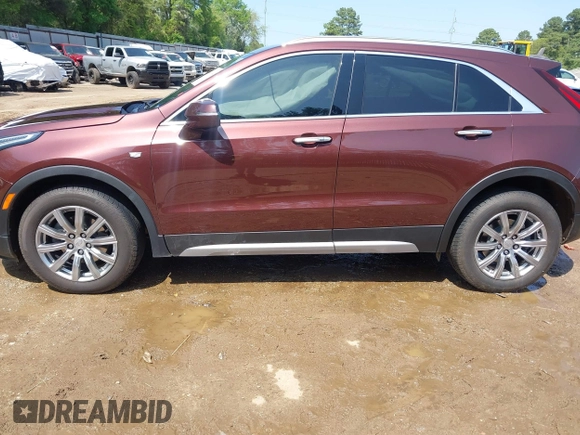 2023 Cadillac XT4 AWD Premium Luxury with VIN 1GYFZDR46PF125499, listed as a IAAI auction lot 41919403 with 44,647 mi miles and . Bid and sale history available at carsss.com. Image 14.