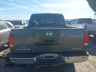 2005 Nissan Titan LE with VIN 1N6AA07B65N501054, listed as a IAAI auction lot 41728466 with 318,859 mi miles. Bid and sale history available at carsss.com. Image 16.