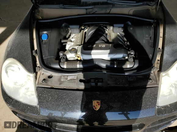 2006 Porsche Cayenne S with VIN WP1AB29P56LA66639, listed as a Copart auction lot 52097595 with 180,827 mi miles and Salvage title. Bid and sale history available at DreamBid. Image 13.
