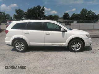 2017 Dodge Journey SXT z VIN 3C4PDCBG3HT537331, wystawiony jako IAAI lot #42694213 z przebiegiem 193 609 mil mil oraz . Historia ofert i sprzedaży dostępna na DreamBid. Obrazek 13.
