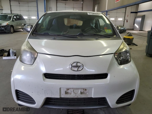 2012 Scion iQ with VIN JTNJJXB02CJ011910, listed as a Copart auction lot 77388604 with 0 mi miles and Salvage Title. Bid and sale history available at carsss.com. Image 5.