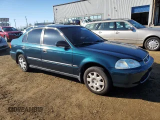1996 Honda Civic z VIN 1HGEJ6507TL021317, wystawiony jako Copart lot #80767574 z przebiegiem 227 670 mil mil oraz Szkoda całkowita • Salvage title. Historia ofert i sprzedaży dostępna na DreamBid. Obrazek 4.