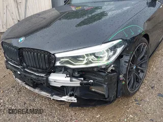 2018 BMW 5 Series M550i xDrive with VIN WBAJB9C5XJB286923, listed as a IAAI auction lot 42527301 with 76,923 mi miles and . Bid and sale history available at DreamBid. Image 6.