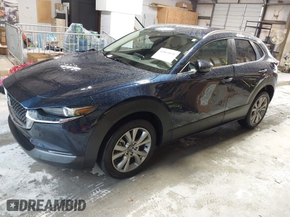2022 Mazda CX-30 S Select z VIN 3MVDMBBL0NM440747, wystawiony jako IAAI lot #41864038 z przebiegiem 9667 mil mil oraz . Historia ofert i sprzedaży dostępna na DreamBid. Obrazek 17.