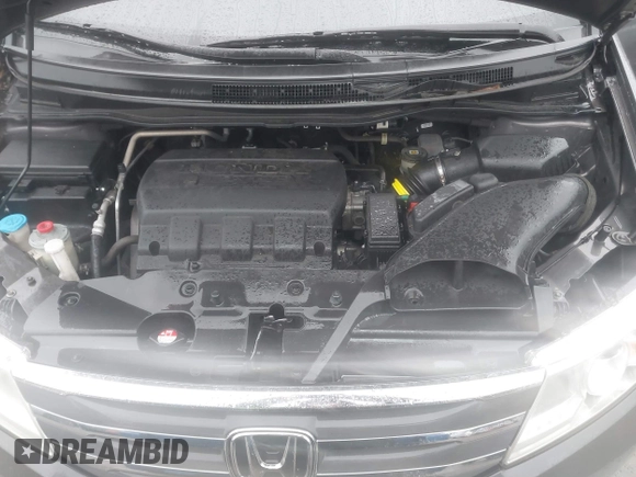 2012 Honda Odyssey EX-L with VIN 5FNRL5H6XCB057557, listed as a IAAI auction lot 42022410 with 174,286 mi miles and . Bid and sale history available at DreamBid. Image 10.