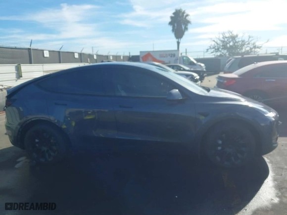 2021 Tesla Model Y Long Range with VIN 5YJYGDEE7MF149037, listed as a IAAI auction lot 41252869 with NaN miles. Bid and sale history available at carsss.com. Image 13.