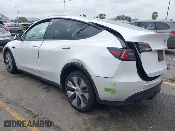 2023 Tesla Model Y Long Range with VIN 7SAYGAEE9PF702910, listed as a IAAI auction lot 42199519 with 91,094 mi miles and . Bid and sale history available at DreamBid. Image 3.