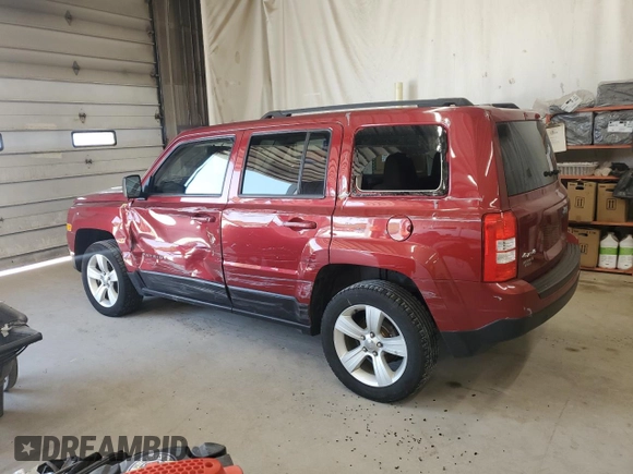 2014 Jeep Patriot Latitude with VIN 1C4NJRFB2ED734624, listed as a Copart auction lot 60675175 with 91,624 mi miles and Salvage title. Bid and sale history available at DreamBid. Image 2.