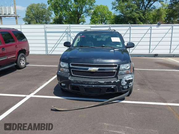 2011 Chevrolet Suburban LT with VIN 1GNSKJE34BR151246, listed as a IAAI auction lot 42520210 with 239,240 mi miles and . Bid and sale history available at DreamBid. Image 12.