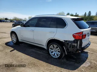 2012 BMW X5 35i z VIN 5UXZV4C59CL759335, wystawiony jako Copart lot #57055065 z przebiegiem 180 589 mil mil oraz Czysty tytuł • Clean title. Historia ofert i sprzedaży dostępna na DreamBid. Obrazek 2.