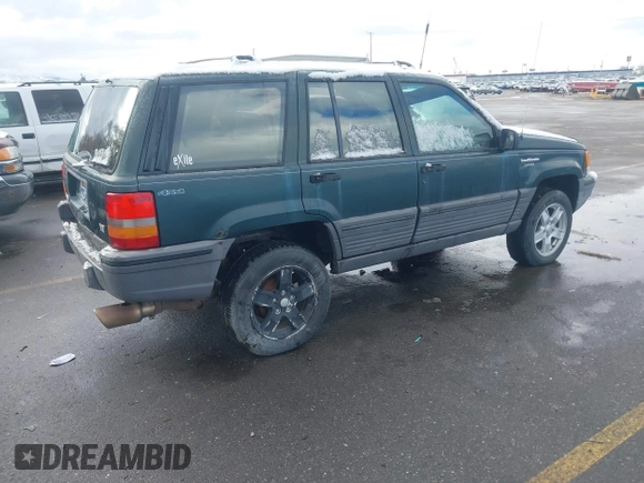 1993 Jeep Grand Cherokee Laredo with VIN 1J4GZ58Y9PC583439, listed as a IAAI auction lot 41794732 with 211,691 mi miles and . Bid and sale history available at DreamBid. Image 4.