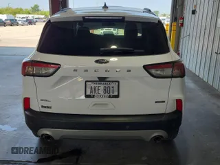 2021 Ford Escape SEL Hybrid with VIN 1FMCU9CZ1MUB25597, listed as a IAAI auction lot 42663573 with 79,061 mi miles and . Bid and sale history available at DreamBid. Image 27.