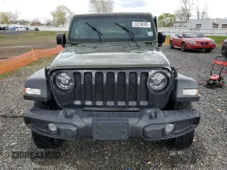 2021 Jeep Wrangler Sport z VIN 1C4GJXAN5MW668474, wystawiony jako Copart lot #53238095 z przebiegiem Nie podano mil oraz Szkody całkowita. Historia ofert i sprzedaży dostępna na DreamBid. Obrazek 5.