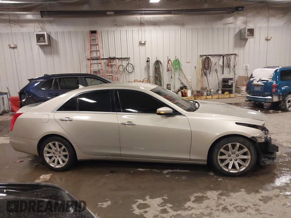 2014 Cadillac CTS Luxury AWD with VIN 1G6AX5S3XE0197628, listed as a IAAI auction lot 41400988 with 144,026 mi miles and . Bid and sale history available at DreamBid. Image 13.