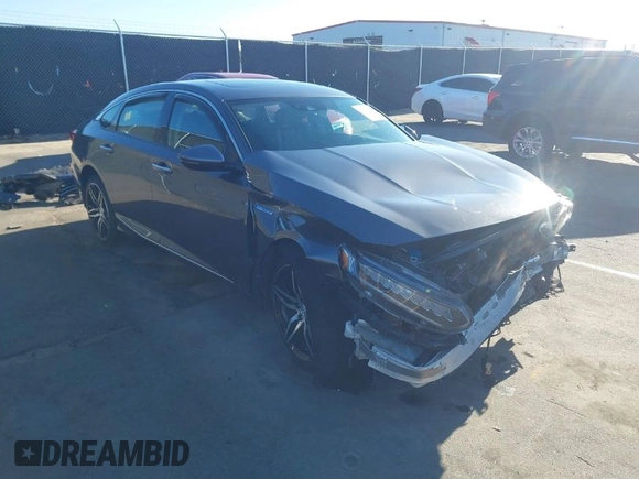 2022 Honda Accord Touring with VIN 1HGCV3F96NA011657, listed as a IAAI auction lot 41701375 with 13,681 mi miles and . Bid and sale history available at DreamBid. Image 1.