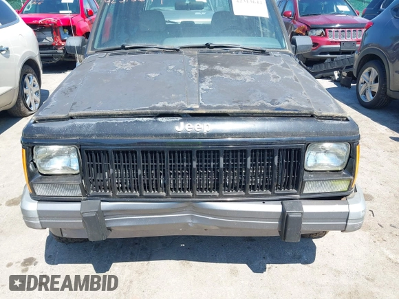 1995 Jeep Cherokee Country z VIN 1J4FJ78S9SL666002, wystawiony jako IAAI lot #42313644 z przebiegiem 226 914 mil mil oraz . Historia ofert i sprzedaży dostępna na DreamBid. Obrazek 6.