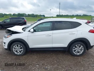 2019 Hyundai Tucson Value z VIN KM8J33A41KU013023, wystawiony jako IAAI lot #42302643 z przebiegiem 41 231 mil mil oraz . Historia ofert i sprzedaży dostępna na DreamBid. Obrazek 14.
