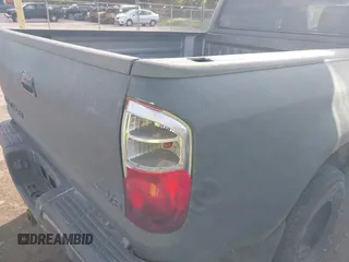 2004 Toyota Tundra SR5 with VIN 5TBET34114S436871, listed as a IAAI auction lot 41735558 with 240,899 mi miles. Bid and sale history available at carsss.com. Image 6.