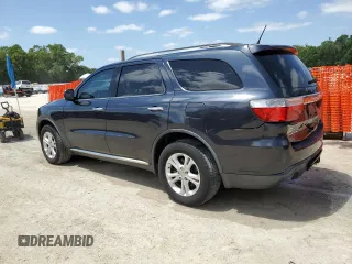 2013 Dodge Durango Crew with VIN 1C4SDHDT3DC679153, listed as a Copart auction lot 54472645 with 167,068 mi miles and Salvage Title. Bid and sale history available at DreamBid. Image 2.