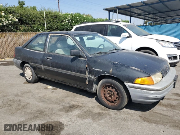 1992 Ford Escort z VIN 1FAPP11JXNW156984, wystawiony jako Copart lot #63462264 z przebiegiem 37 774 mil mil oraz Szkoda całkowita • Salvage title. Historia ofert i sprzedaży dostępna na DreamBid. Obrazek 4.