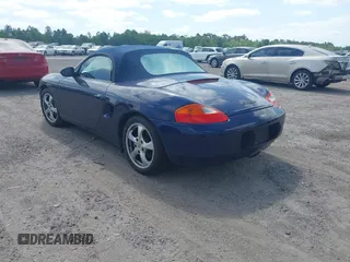 2002 Porsche Boxster with VIN WP0CA29812U622973, listed as a IAAI auction lot 42104707 with 56,744 mi miles and . Bid and sale history available at DreamBid. Image 3.