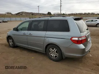 2005 Honda Odyssey EX-L with VIN 5FNRL38715B116530, listed as a Copart auction lot 50807575 with 216,434 mi miles and Salvage Title. Bid and sale history available at DreamBid. Image 2.