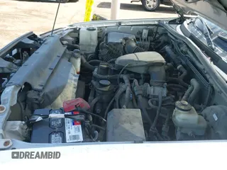 2015 Toyota Tacoma PreRunner z VIN 5TFTX4GN5FX039152, wystawiony jako IAAI lot #42702609 z przebiegiem 127 612 mil mil oraz . Historia ofert i sprzedaży dostępna na DreamBid. Obrazek 19.