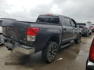 2013 Toyota Tundra с VIN 5TFDW5F13DX297551, выставлен на аукционе Copart как лот 51638505 с пробегом 116 812 миль миль и Списание • Salvage title. История ставок и продаж доступна на DreamBid. Изображение 3.