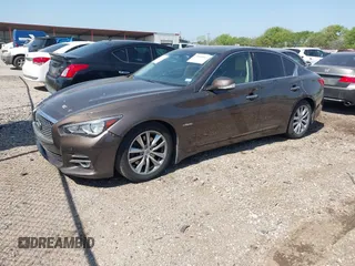 2014 Infiniti Q50 Hybrid Premium with VIN JN1AV7AP7EM691329, listed as a IAAI auction lot 41858913 with 144,688 mi miles and . Bid and sale history available at DreamBid. Image 18.