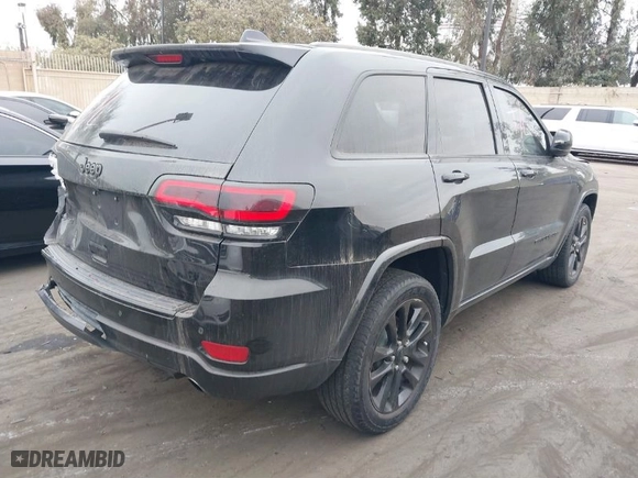 2018 Jeep Grand Cherokee Altitude with VIN 1C4RJFAG8JC121202, listed as a IAAI auction lot 41205040 with 111,407 mi miles. Bid and sale history available at carsss.com. Image 4.